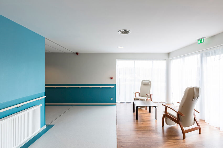 hospital room with bump rails on the walls