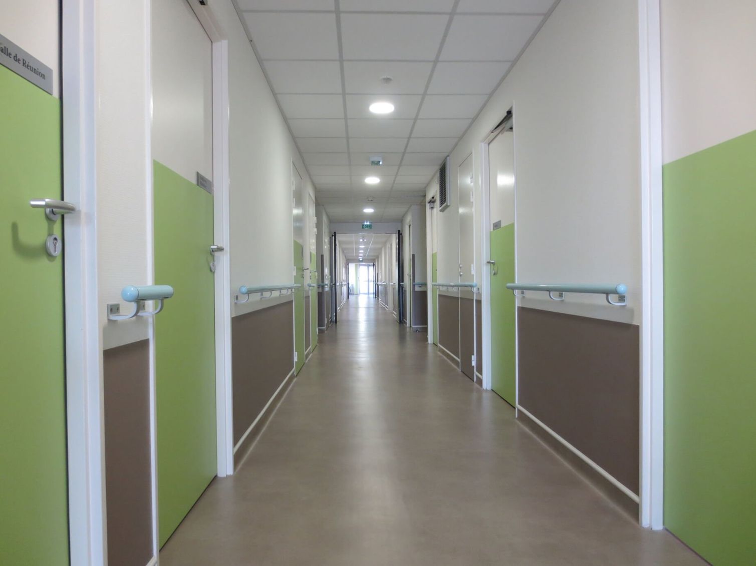 hospital corridor with wall mounted rails