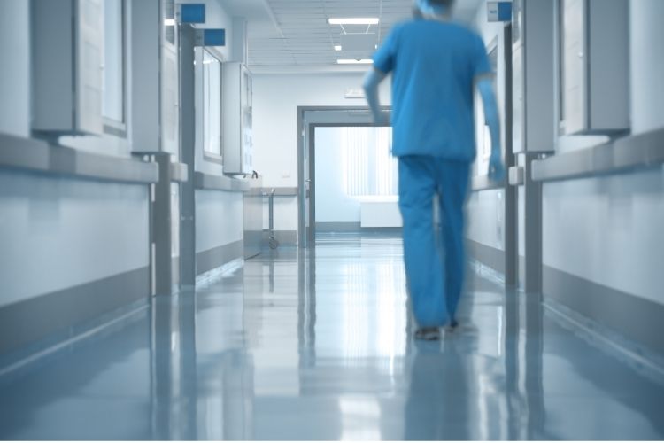 Nurse walking in a hospital corridor