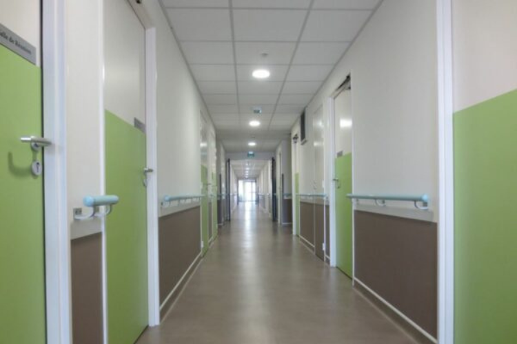 Hallway with door protection and railings